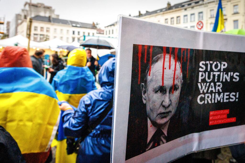 A banner depicting Russian president Vladimir Putin is displayed during a performance by Go-to Ukrainian, an organisation advocating for the interests of Ukraine, in Brussels on Tuesday to mark 1,000 days since Russia's full-scale invasion of its neighbour. Photograph: Olivier Matthys/EPA