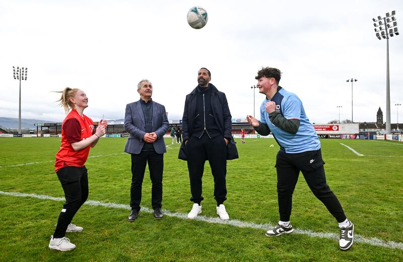 Rio Ferdinand (second right) and Paddy Harte (second left), chair of the International Fund for Ireland, with Phoebe Wallace and Torry Sloan at the Beyond the Ball event hosted by Sligo Rovers. Photograph: David Fitzgerald/Sportsfile