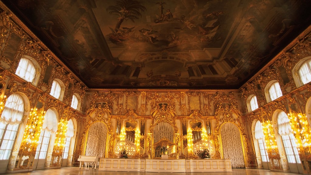 Reconstruction of the Amber Room in Catherine Palace, Saint Petersburg: Two German treasure hunters claim the priceless room panels, gifted by Kaiser Friedrich Wilhelm to Tsar Peter the Great 300 years ago, are  hidden in  a Bohemian Castle’s cellar. Photograph:  Patrick Aventurier/Gamma-Rapho/Getty