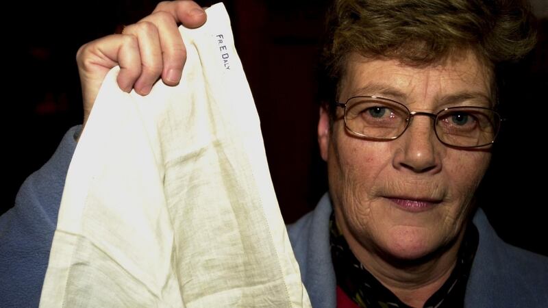 Kay Duddy, brother of Gerry Duddy, with the handkerchief waved by Fr Edward Daly while her dying brother Jackie was carried from the scene of the Bloody Sunday massacre in Derry. Photograph: Trevor McBride