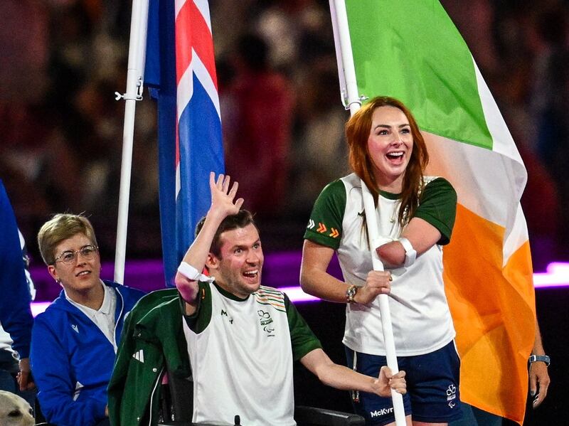Ireland flag-bearers Ellen Keane and Michael Murphy during the closing ceremony of the Paralympic Games in Paris. Photograph: Ramsey Cardy/Sportsfile
