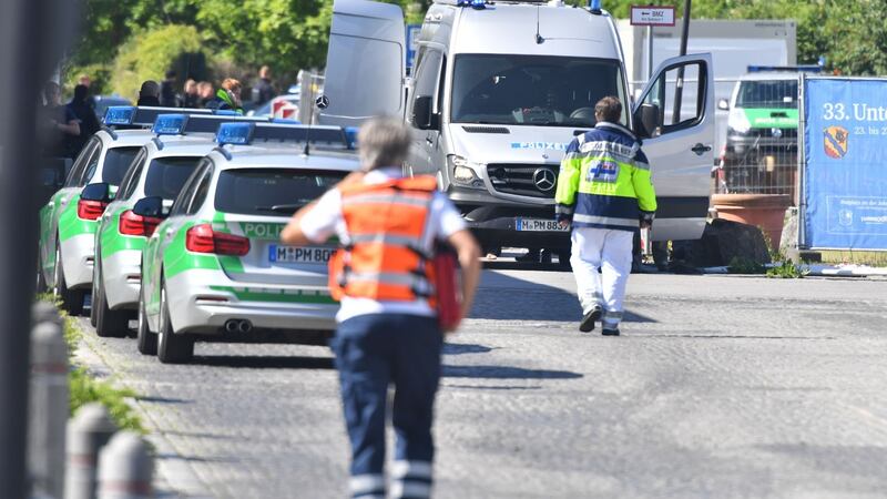 Rescuers arrive near a subway station in Munich, Germany, where several people were injured in a shooting.  Photograph: AP