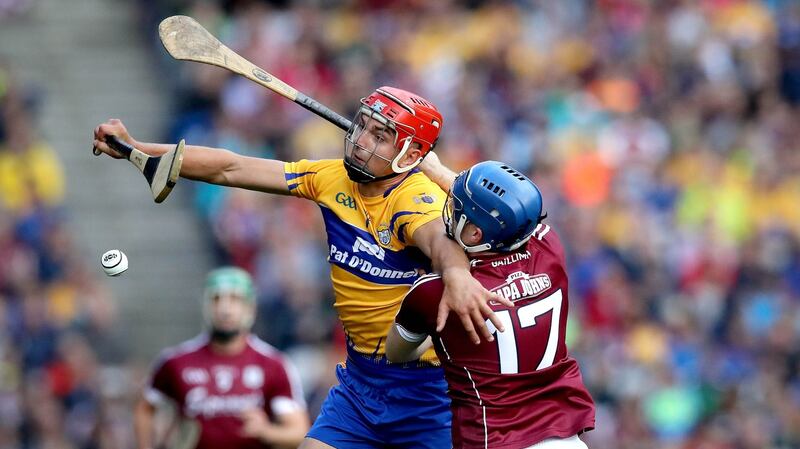 Galway’s Paul Killeen tackles Peter Duggan of Clare during their All-Ireland SHC semi-final clash at Croke Park. Photo: Ryan Byrne/Inpho