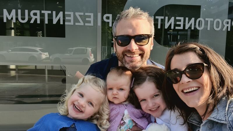 Mum and Dad Deirdre and Brian Leahy, with Saorla, baby Caoimhe, and Corlaith, outside Radiotherapy Clinic in Essen, Germany