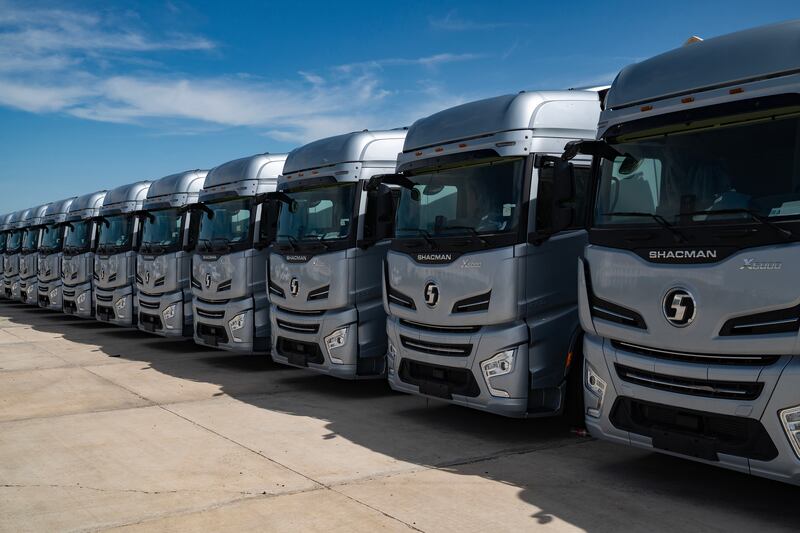 Trucks made in China parked at the border in Manzhouli. Photograph: New York Times