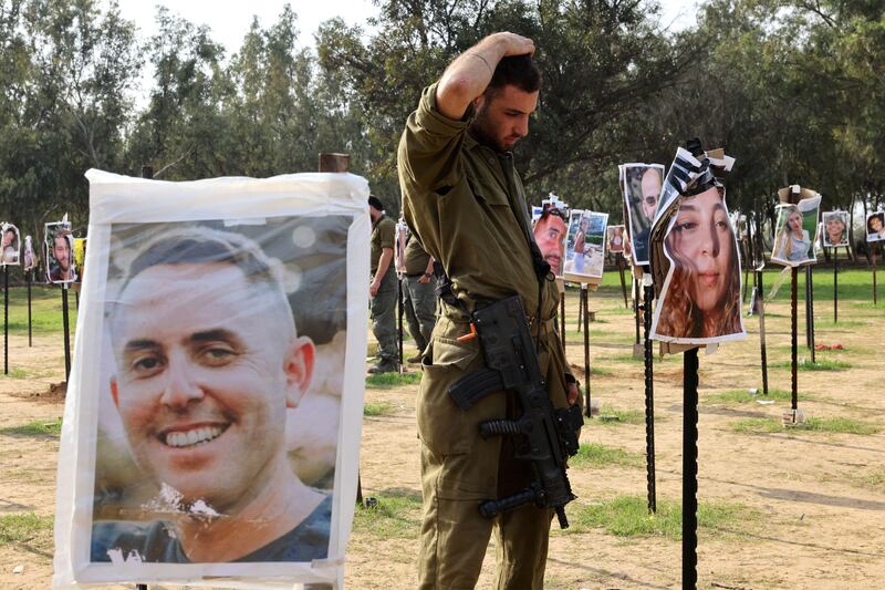 Israeli soldiers gather on December 17th at the abandoned site of the Supernova music festival, which was attacked by Hamas gunmen on October 7th. Photograph: Jack Guez/AFP via Getty Images