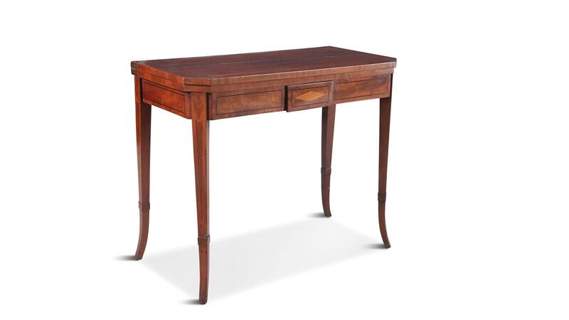 Lot 318: a foldover card table with canted corners and tapering supports (€600-€900).
