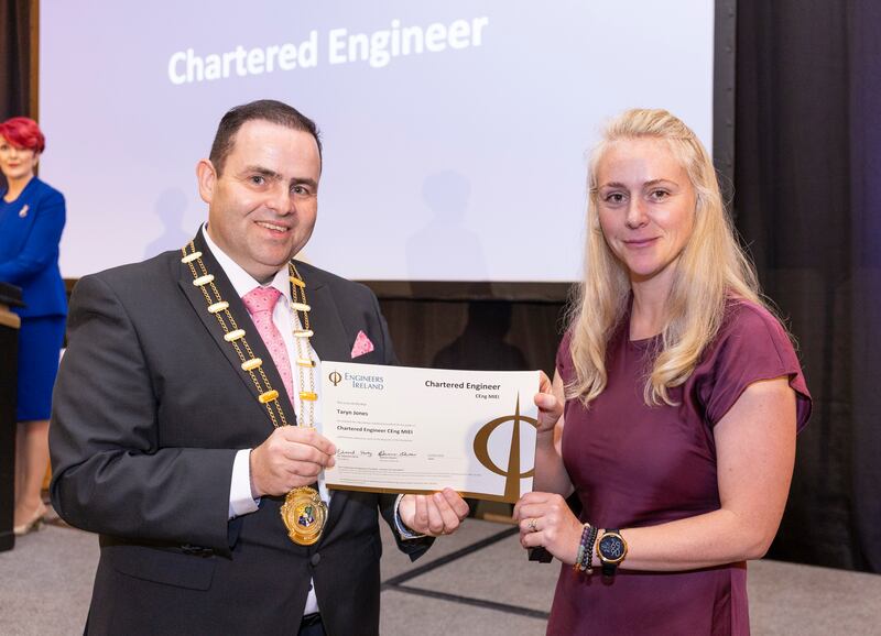Engineers Ireland president Edmond Harty awards the title of Chartered Engineer to Taryn Jones