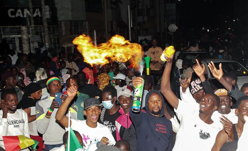 Supporters of Bassirou Diomaye Faye attend a rally in Dakar on Sunday as the results of the presidential elections are tallied. Photograph: Aliou Mbaye/EPA-EFE