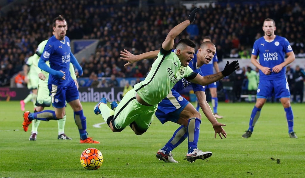 Manchester City’s Sergio Aguero and Leicester City’s Gokhan Inler in action during the sides’ Premier League clash. Photo: Carl Recine/Reuters