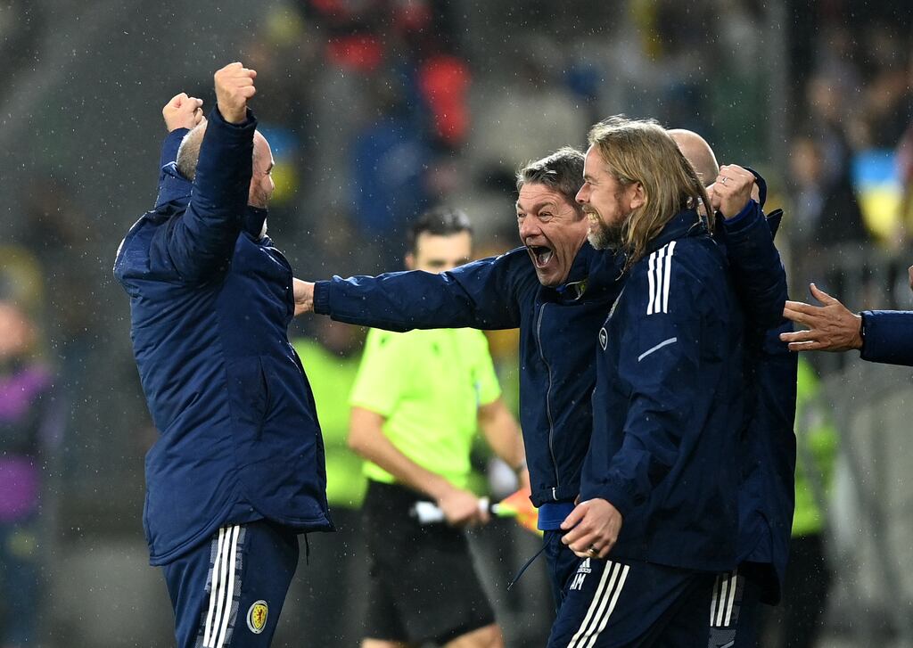 Scotland head coach Steve Clarke (left) celebrates with his staff after the UEFA Nations League match at the Stadion Cracovii in Krakow, Poland. Photograph: PA