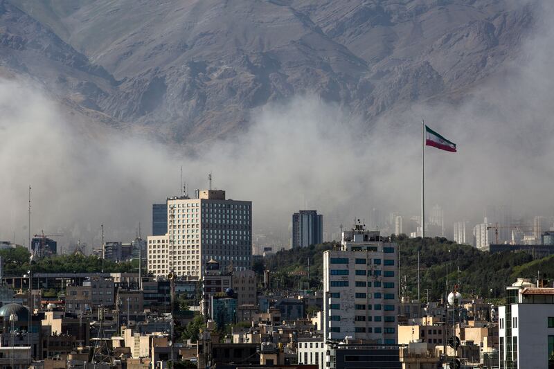 Smoke fills the sky in Tehran, Iran, following Israeli airstrikes in June. Photograph: Arash Khamooshi/The New York Times