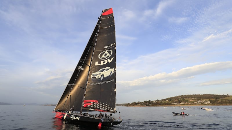 LDV Comanche sails up the Derwent river towards the finish line of the 2017 Sydney to Hobart Yacht Race in Hobart, Tasmania. Photograph: Rob Blakers/EPA