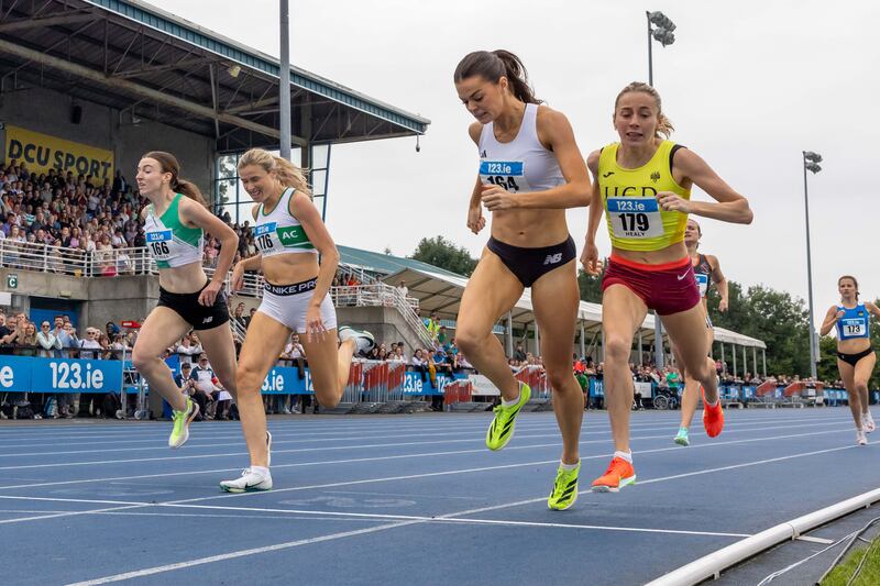 Alex O’Neill holds off Sarah Healy to win the women’s 800m final. Photograph: Morgan Treacy/Inpho