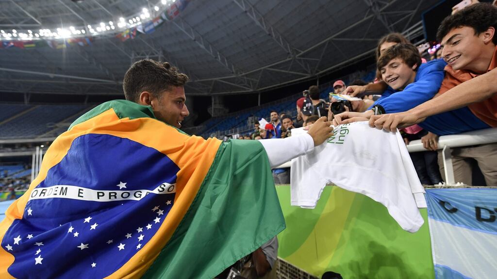 Brazil’s Thiago Braz da Silva celebrates his victory at the end of the men’s pole vault final. Photograph: Getty Images