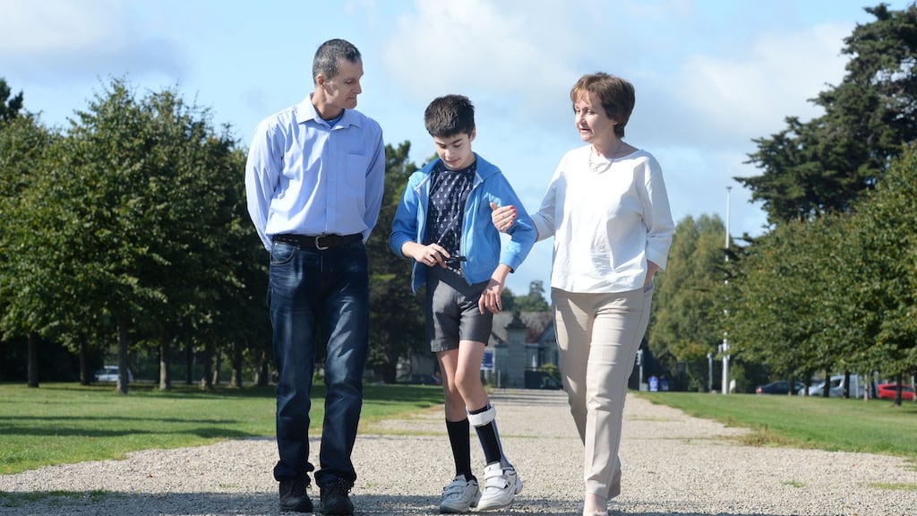 A file photograph of Christopher Karagiorgis with his parents Dimitris Karagiorgis and Diane Payne. Photograph: Alan Betson