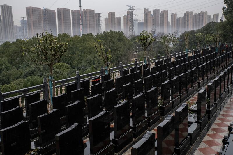 Lines of graves at the Biandanshan cemetery, one of the largest in Wuhan. Photograph: Gilles Sabrie/The New York Times