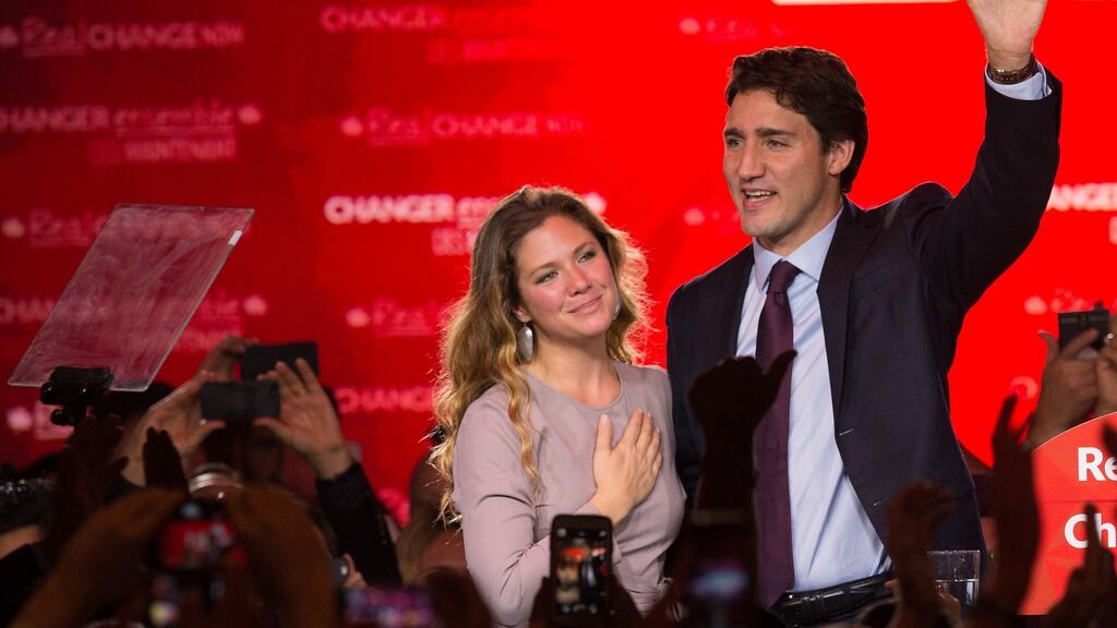 Canadian Liberal Party leader Justin Trudeau with his wife Sophie: Mr Trudeau said Canadians had spoken loudly in favour of a government “with a vision and an agenda for this country that is positive and ambitious and hopeful”. Photograph: Nicholas Kamm/AFP/Getty Images