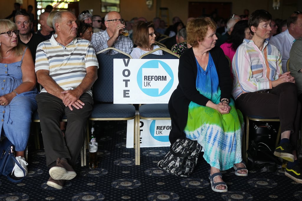 Delegates attend the the Reform UK party's summer rally at Staffordshire Showgrounds in Stafford, England. The Reform UK campaign threatens to further undermine the Conservatives' electoral performance in the July 4th general election. Photograph: Christopher Furlong/Getty