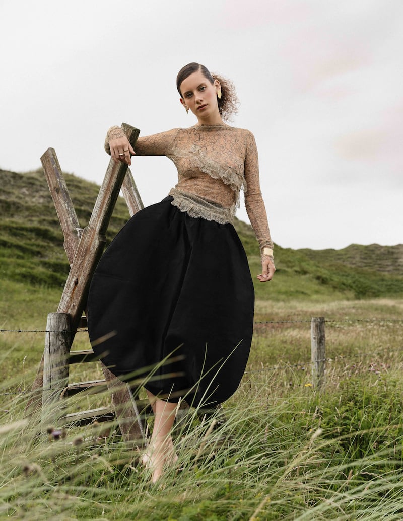 Lace top Ellie Moloney, NCAD graduate, skirt Dare to Howl Designs by Hollie Marie Gallagher ATU graduate, bracelet Jenny Vander, rings by Emer Roberts. Photograph: Chloe Aillud