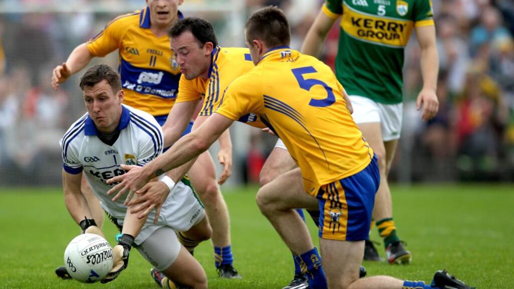 Clare’s David Tubridy and Ciaran Russell in action against Kerry goalkeeper Brian Kelly. Photo: Ryan Byrne/Inpho