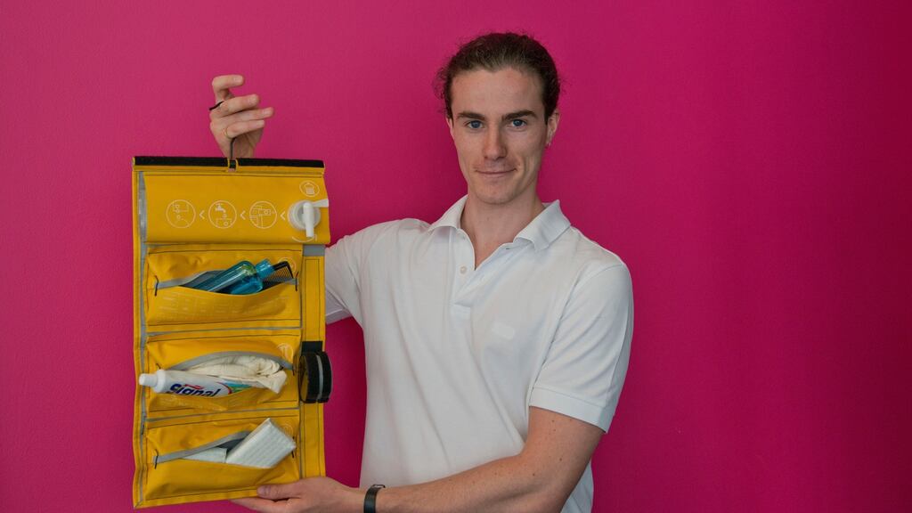 John Godfrey with his project design of a practical wash bag that could be distributed to refugees as they arrive in migrant camps to help with their basic hygiene needs. Photograph: Brenda Fitzsimons/The Irish Times