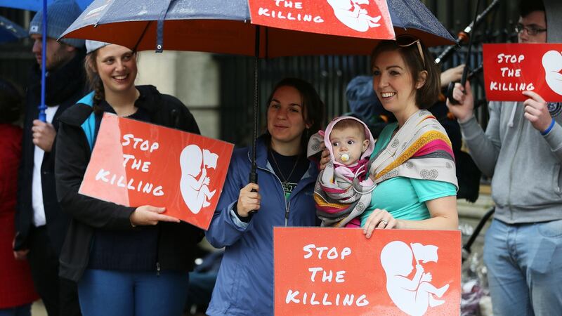 Anti-abortion campaigners outside Leinster House, as the first public meeting of the Dail Committee on the Eighth Amendment opened. Photograph: Brian Lawless/PA Wire