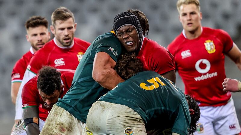 British & Irish Lions’ Maro Itoje is tackled by Franco Mostert of South Africa during the first Test in Cape Town. Photograph: Dan Sheridan/Inpho