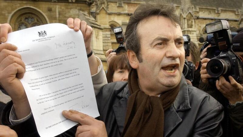 Gerry Conlon faces the media showing them the letter of apology he received from British prime minister Tony Blair outside the House of Commons in  London on  February 9th, 2005. File photograph: Stefan Rousseau/PA