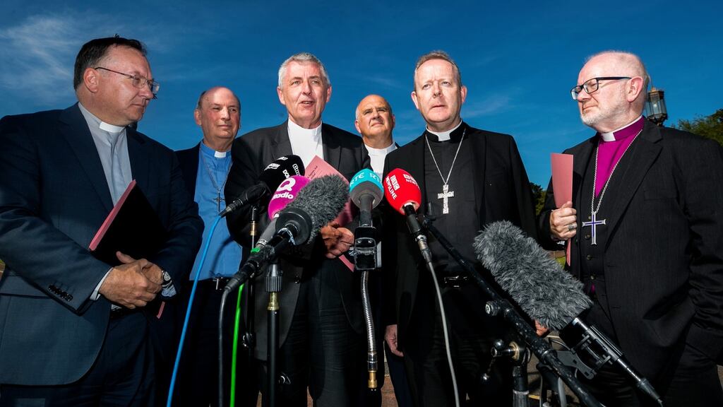 Rev Charles McMullen (third from left), speaking to media with church leaders Rev Trevor Gribben (left), Rev Brian Anderson (second from left), Rev William Davison (third from right), Arch Bishop Eamon Martin (second from right), and Rev Richard Clarke (right), following a meeting with political leaders at Stormont. Photograph: Liam McBurney/PA Wire.