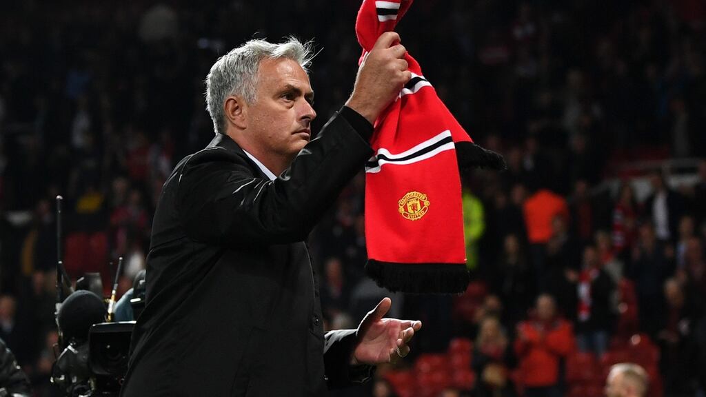 José Mourinho stayed on the pitch to applaud the Manchester United fans after their defeat to Tottenham Hotspur. Photo: Michael Regan/Getty Images