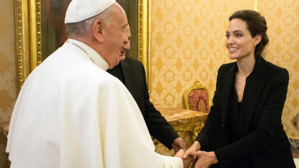 Pope Francis with US actress Angelina Jolie in the gold brocaded Throne Room. Photograph: Osservatore Romana/EPA