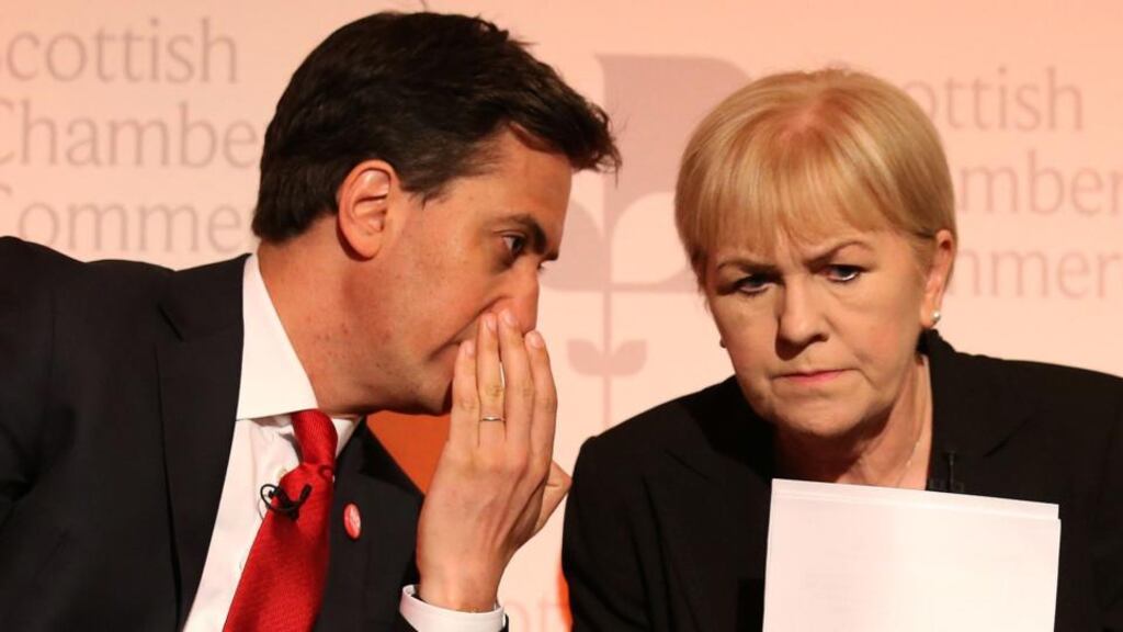 Labour leader Ed Miliband speaking to Johann Lamont who has resigned as leader of the Scottish Labour Party. Photograph: Andrew Milligan/PA Wire