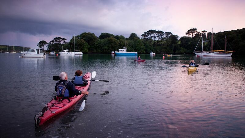 Sea kayaking at Reen Pier, Union Hall, west Cork at twilight. Photograph: Emma Jervis