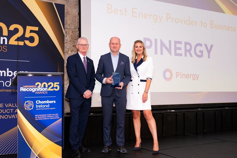 Ian Talbot, chiuef executive of Chambers Ireland; Tadhg Gunnell, director of markets, risk and regulation at Pinergy; and Anna Daly, MC of the awards. Photographer: Ruben Morrissey-Fernandez/Ruby Productions