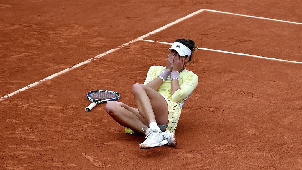 Garbine Muguruza reacts after winning against Serena Williams in the women’s single final match at the French Open tennis tournament at Roland Garros in Paris. Photo: PA