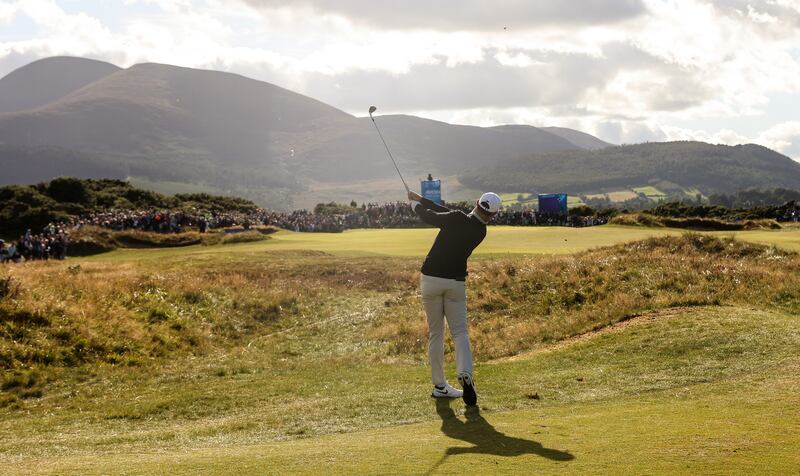 Rory McIlroy hits down the 15th fairway at Royal County Down. Photograph: Ben Brady/Inpho
