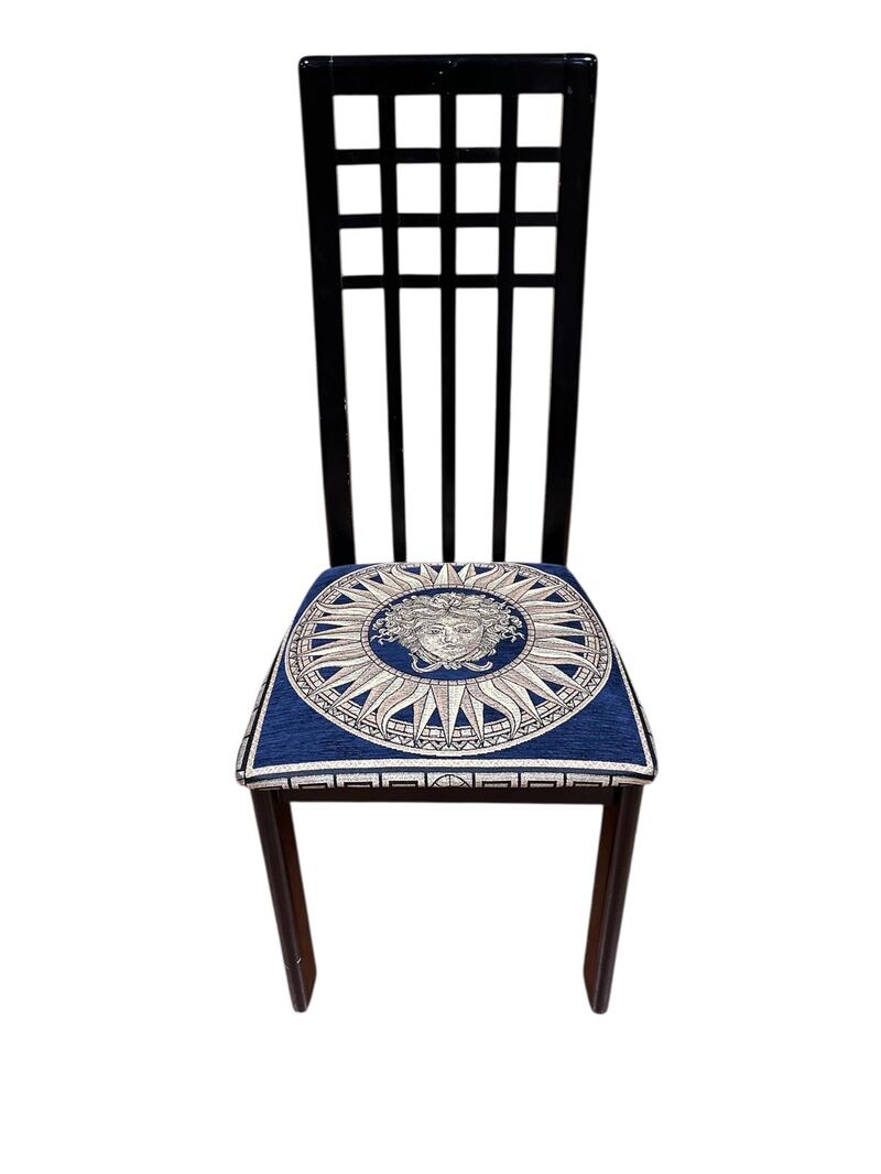 The Charles Rennie Mackintosh-style black lacquered side chair with medusa pattern upholstered seat (€60-€100) at Mullens auction rooms
