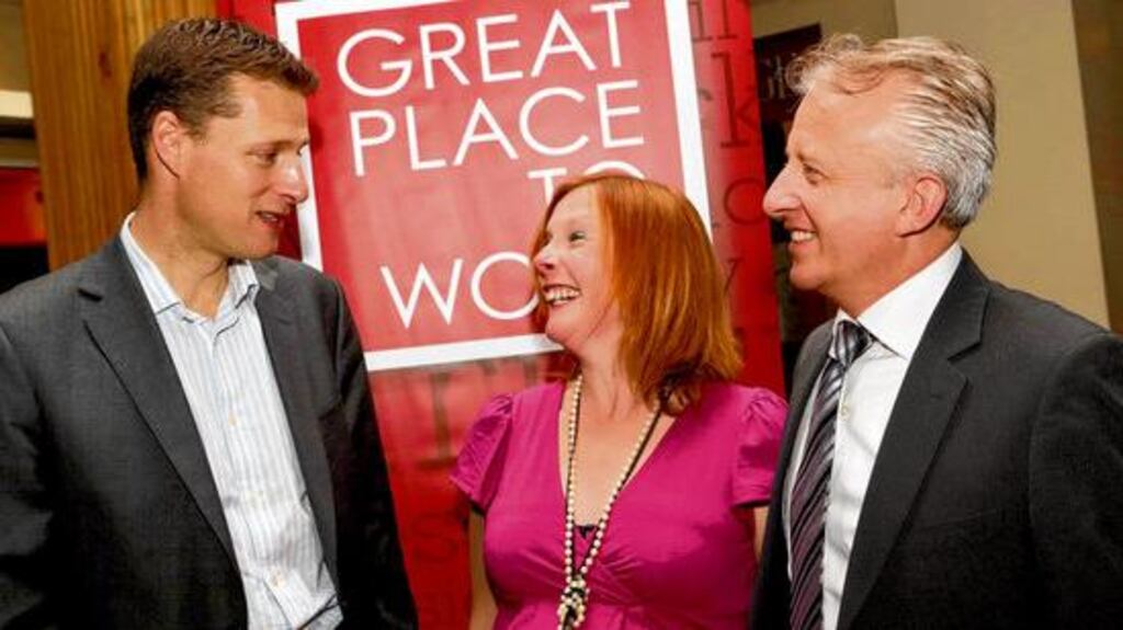 David Smith, managing director of Diageo Demand, winner of Best Large Workplace in Ireland with Fiona Wilson and John Ryan of Great Place to Work at the awards in the Burlington Hotel in Dublin last night. photograph: conor mccabe
