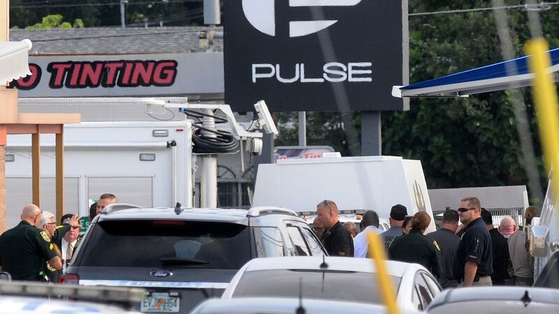 Orlando police officers outside Pulse nightclub after a fatal shooting and hostage situation. The suspect was shot and killed by police after 50 people died and 53 were injured. Photograph: Gerardo Mora/Getty Images.