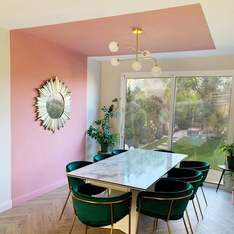 The canopy effect used in a dining room space is  easy to replicate.