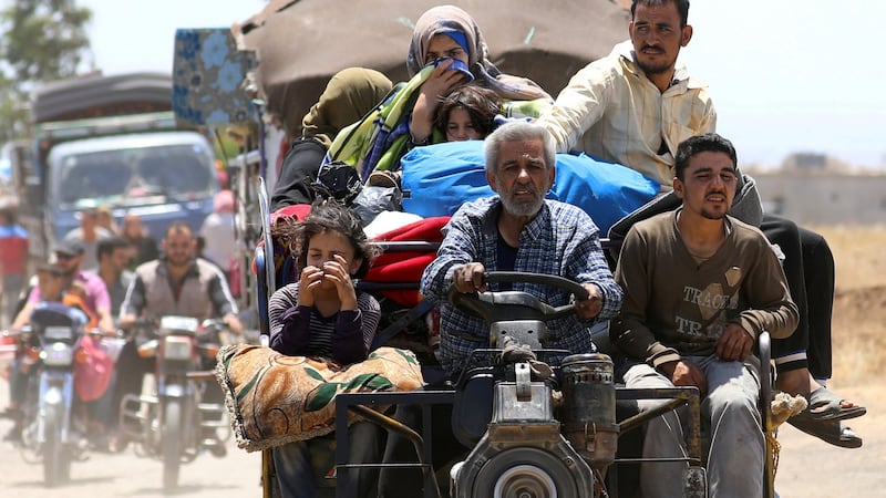 Internally displaced people from Deraa province arrive near the Israeli-occupied Golan Heights in Quneitra, Syria, on June 29th. Photograph: Alaa Al-Faqir/Reuters
