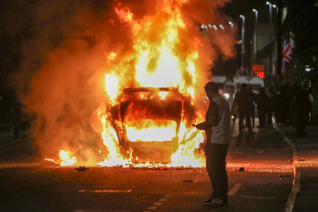 A vehicle is set alight during a second night of unrest in Ballymena, Co Antrim, on Tuesday night. Photograph: Paul Faith/AFP