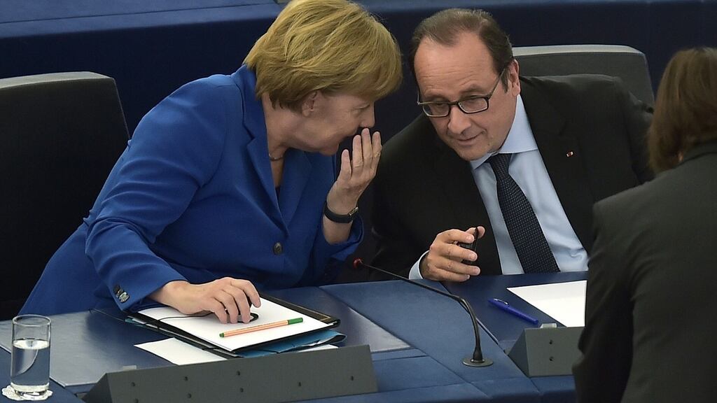 German chancellor Angela Merkel and French president Francois Hollande during their joint address at the European Parliament in Strasbourg, France. Photograph: Patrick Hertzog/AFP/Getty Images