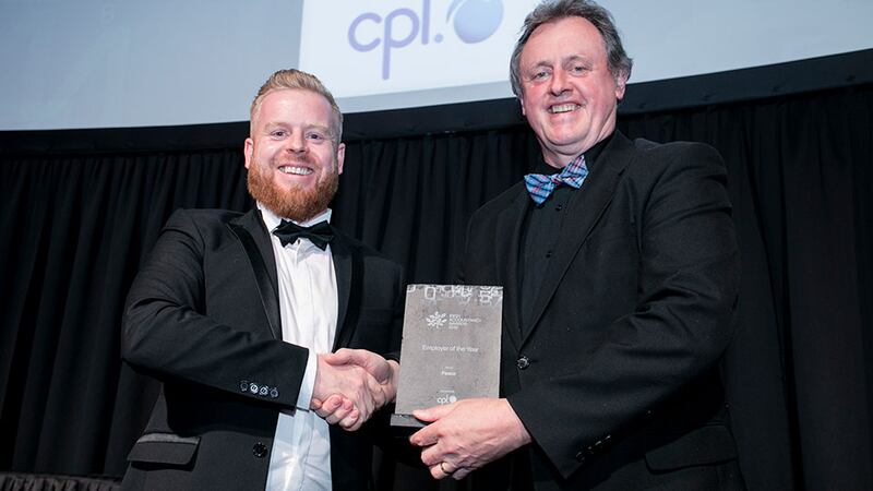 Ciaran Bergin, Associate Director, Cpl, presents the Employer of the Year award to Ger O'Sullivan, Fexco.