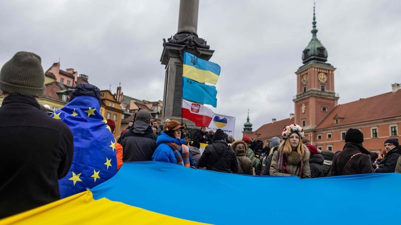 Protesters wave Ukrainian and Polish flags during a demonstration for peace in Ukraine, in Warsaw, Poland, on February 20th, 2022. Photograph: Wejtek Radwanski/AFP via Getty Images