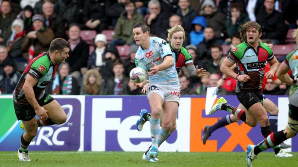 Johnny Sexton makes a rare break for Racing Metro against Harlequins at the Stoop this afternoon. Photograph: Andrew Fosker/Inpho