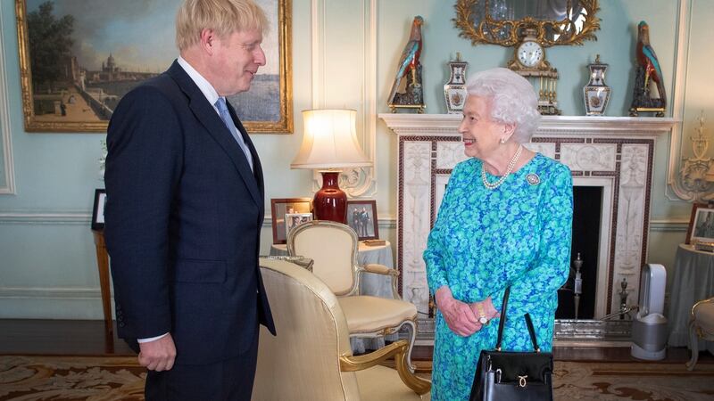 Britain’s Queen Elizabeth II welcomes newly elected leader of the Conservative party Boris Johnson at Buckingham Palace, where she invited him to become prime minister and form a government. Photograph: Victoria Jones/EPA