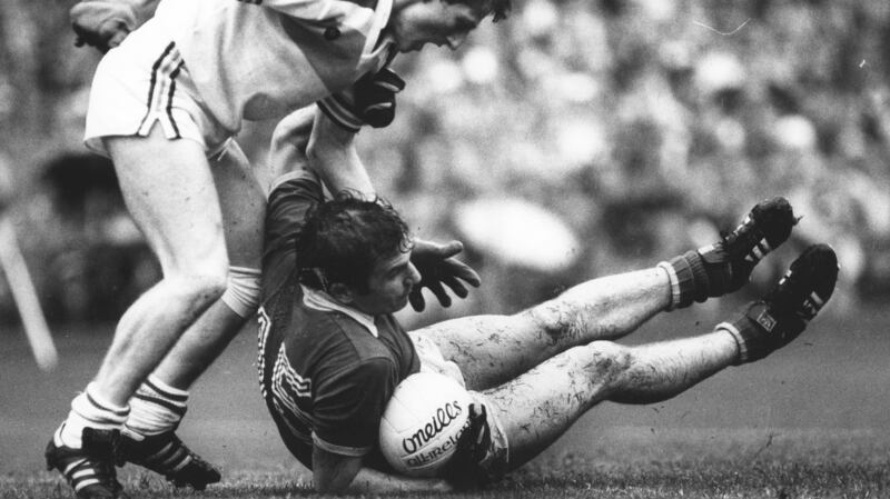 Kerry’s John Egan under pressure against Offaly in the 1982 All-Ireland football final. Photograph: Billy Stickland/Inpho