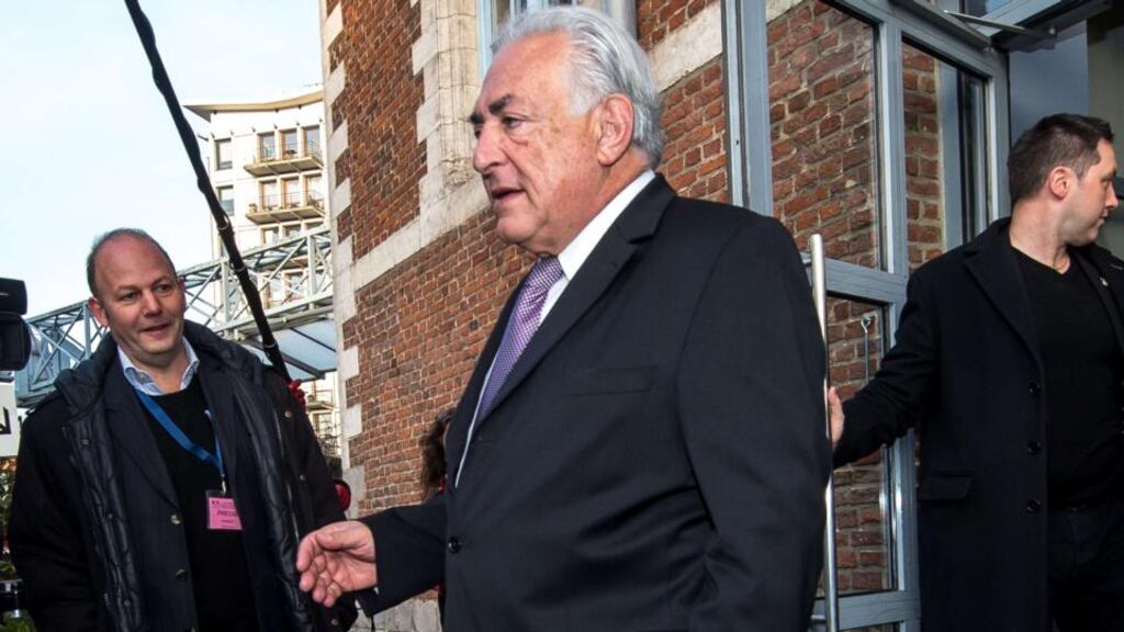 Ex-IMF chief Dominique Strauss-Kahn leaves his hotel during the third week of the so-called “Lille Carlton Hotel Case” trial. Photograph: Getty